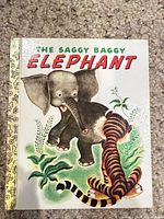 Front cover showing title, illustration, gold foil spine