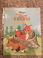 Front cover showing title, characters, gold spine