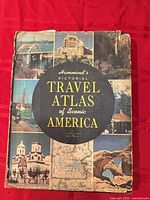 Front cover showing title and montage images, visible wear at edges