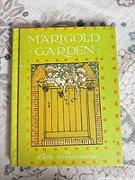 Front cover showing title Marigold Garden and illustration of three children over gate.