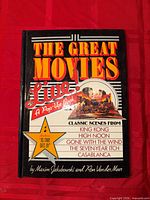 Front cover of pop-up book showing title and featured movies