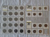 Overall view of three binder pages of coins