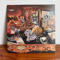 Front cover of gatefold LP showing title, artist and artwork