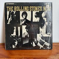 Front cover with shrink wrap and album title