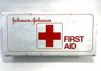 Front of sealed Johnson & Johnson first aid kit showing branding and red cross