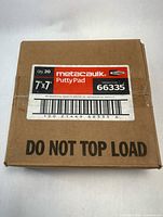 Front view of sealed box showing brand, quantity, dimensions, and warning text