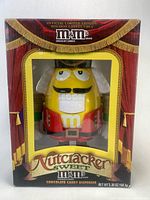Front of boxed M&M's Nutcracker Sweet candy dispenser