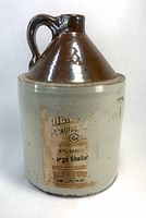 Front view showing jug, handle, label fragment