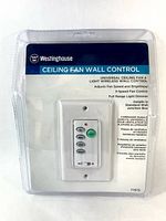 Front of sealed package showing Westinghouse ceiling fan wall control, model 77875