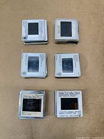 Six stacks of mounted 35 mm slides