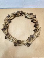 Front view of entire faux antler wreath