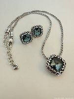 Necklace with pendant and matching earrings overview