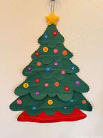 Full view of felt Christmas tree wall hanging with numbered pockets