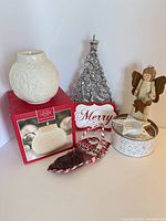 Group shot showing all seven holiday décor items