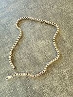 Necklace laid out to show full chain and clasp