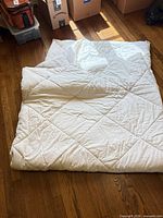 Comforter laid flat showing quilted pattern