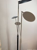 Full view of lamp showing both disc shades and chrome rods