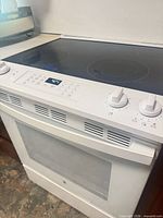 Front angled view showing entire range, cooktop and oven door