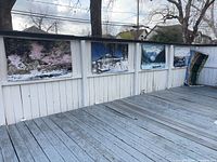 View of all five canvas panels mounted on patio railing