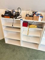 Front view pair of white five-shelf units