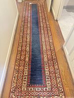 Full view of runner rug laid on hardwood floor