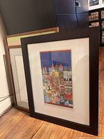 Front view of Paul Klee Marjamshausen print in black frame with additional framed piece behind