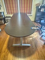 Top view of the full desk showing boat shape and finish