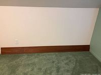 Full view of entire walnut board against wall