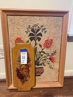 Framed seed mosaic and wood plaque together