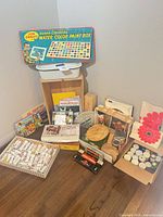 Entire lot showing watercolor lid, paint tubes, jars, chess pieces and crates