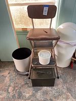 Overall lot showing Cosco chair, ammo box, planter, first-aid tub
