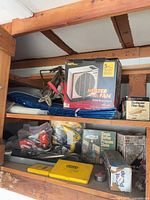 Patton heater fan, blue tarp, clamp, hand tools, drill bit set, propane stove box