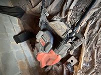 Top view of cordless mower showing battery compartment and handle