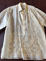 Front view of entire Barong Tagalog showing embroidery pattern and overall condition