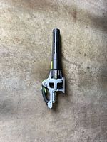 Full view of EGO cordless leaf blower lying on concrete floor