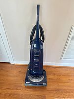 Full front view of Kenmore Progressive upright vacuum