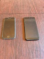 Front view of both smartphones side by side displaying screens