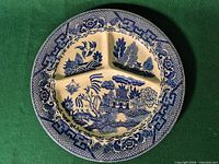 Full view of round divided grill plate showing Blue Willow pattern and three sections