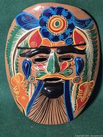 Full view of painted Mexican ceramic mask