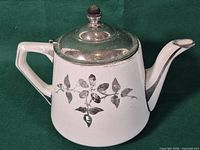 Full view of Buffalo Pottery Royal Rochester teapot showing overall form, decoration and lid