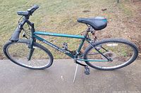 Full side view of Diamond Back mountain bike showing overall condition, frame, wheels, saddle, kickstand