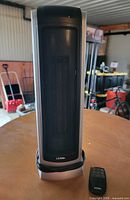 Front view of Lasko tower heater showing control panel and overall appearance