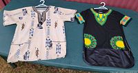 Both dashiki shirts full view