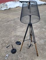 Desk lamp and floor lamp side by side outdoors