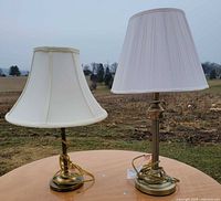 Both brass lamps side by side showing size difference and shades