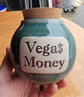 Front view showing plaque text and glaze