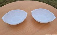 Top view of both milk glass bowls showing grapevine pattern