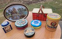 Group shot of all seven tins on table