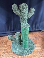 Full view of cactus scratching post on round base