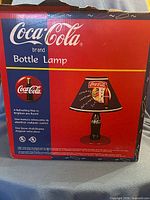 Retail box front showing Coca-Cola Bottle Lamp branding